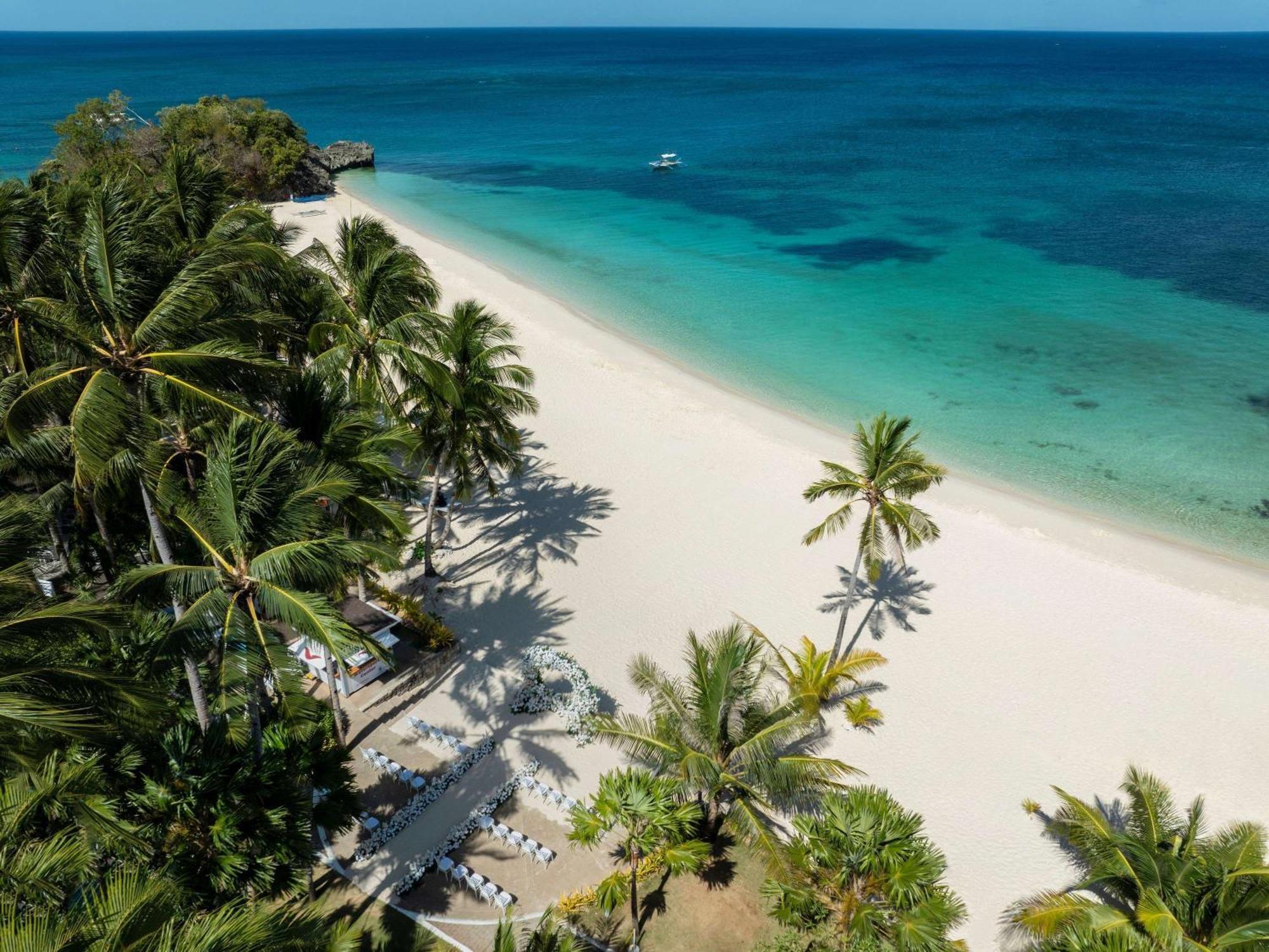 โมเวนปิค รีสอร์ต แอนด์ สปา โบราไกย์ Hotel Yapak ภายนอก รูปภาพ Beach at the island of Siargao
